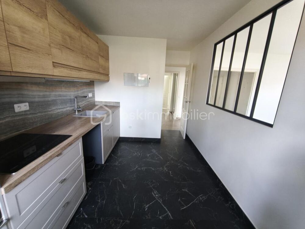 Appartement 3 pièces de 65m² avec balcon, parking et cave
