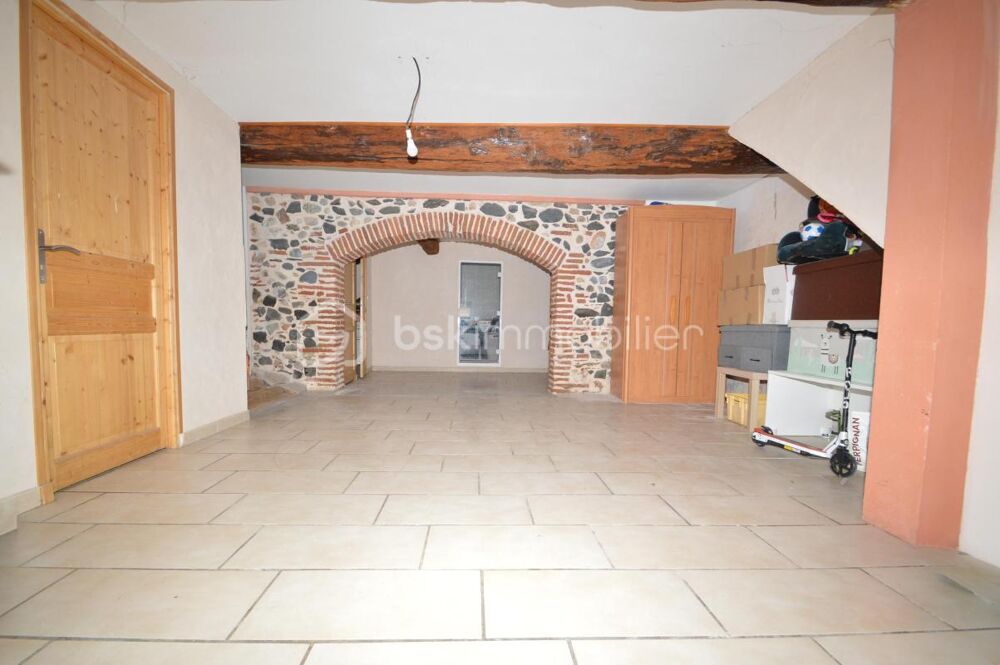 Maison de village avec grand garage