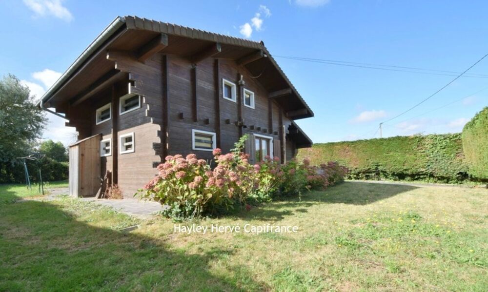 À vendre, à deux pas de la plage : chalet avec terrain, garages et beau potentiel Asnelles (14) (Calvados)