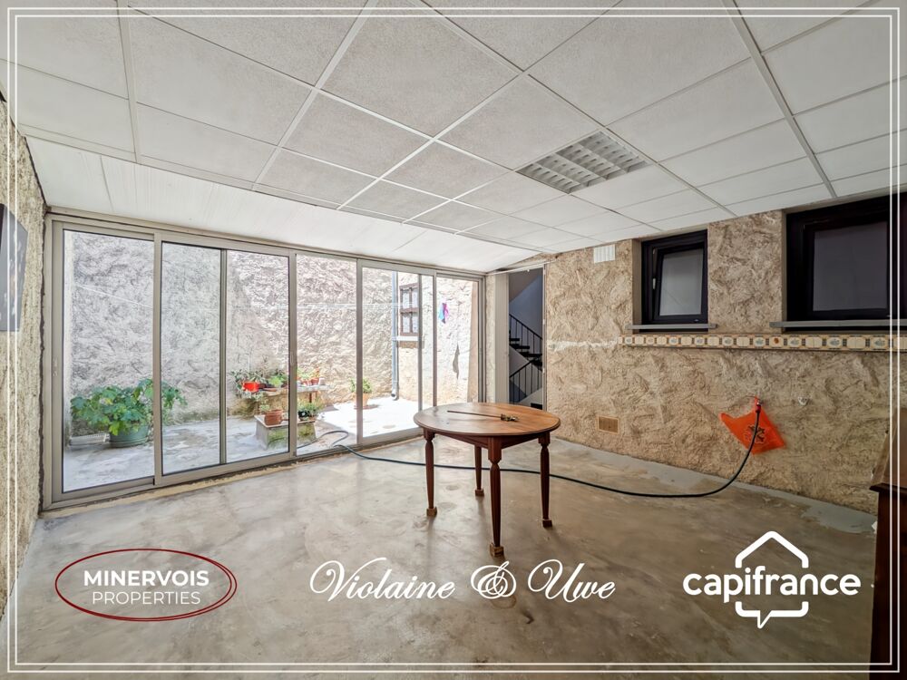 Maison en pierre rénovée avec grand garage, terrasse, cour et terrain  Siran (34210)