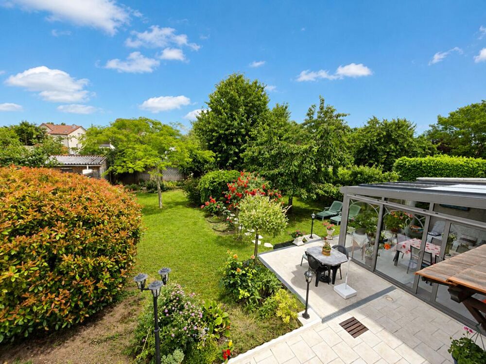 Maison individuelle avec 4 chambres, véranda et magnifique jardin - 175 M2 utiles
