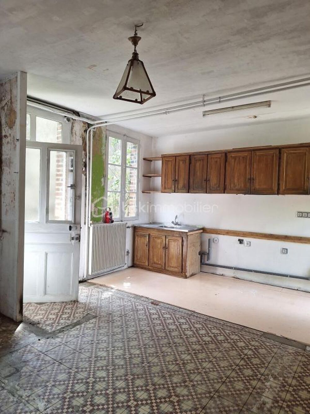 Centre-ville  Maison à rénover avec grenier aménageable et potentiel d'agrandissement