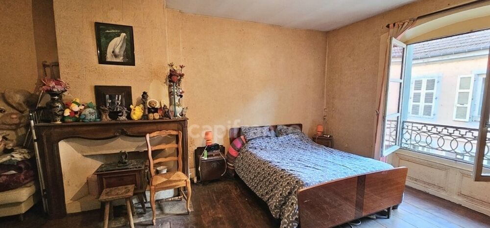 Charmant appartement à rénover avec grenier aménageable au centre-ville d'Arbois 39600