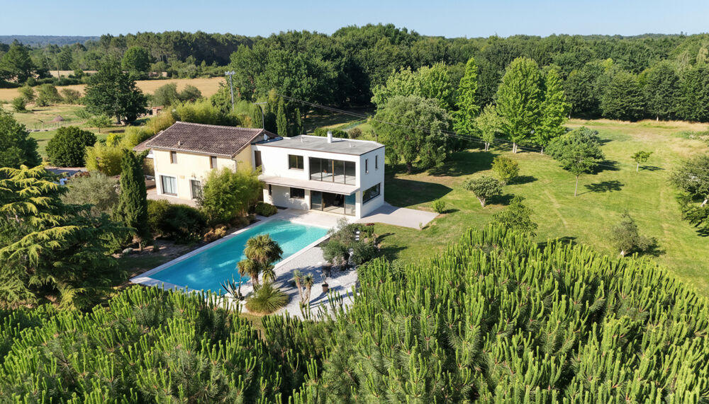 Propriété d'exception avec extension contemporaine, parc arboré, piscine et potentiel domaine privé entre Bordeaux et Périgueux