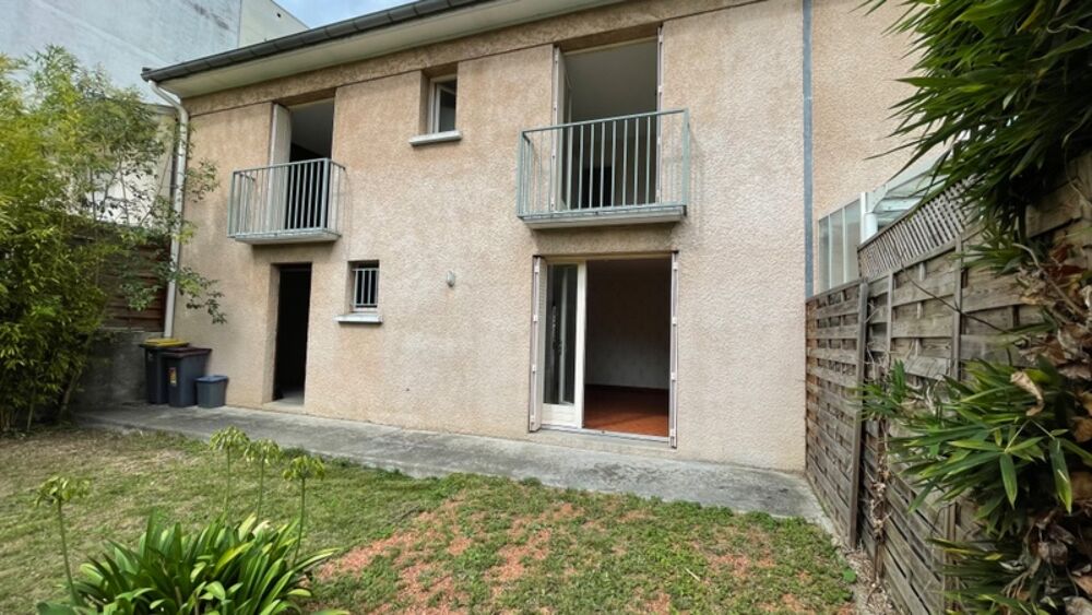 Tarbes centre ville proche commerces ,maison de ville 120M2 habitables, avec 4 chambres, Garage, terrain sans vis à vis