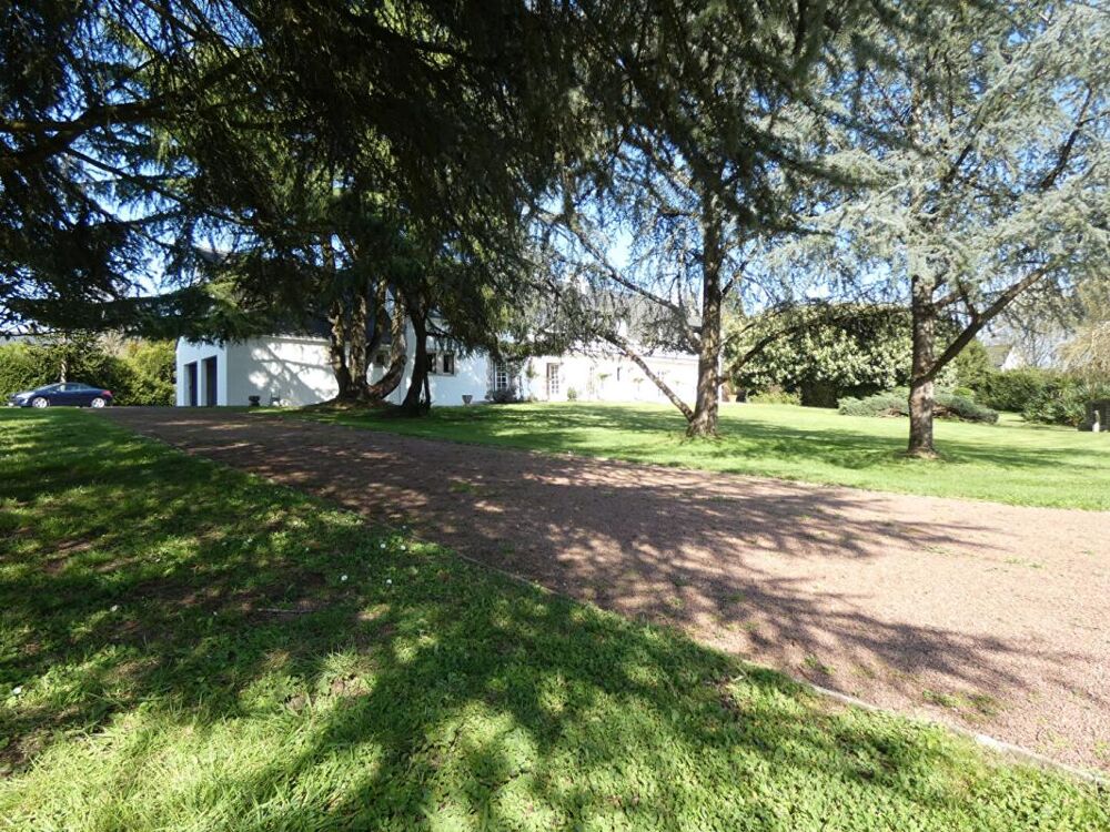 Propriété dans un parc arboré de 2 ha