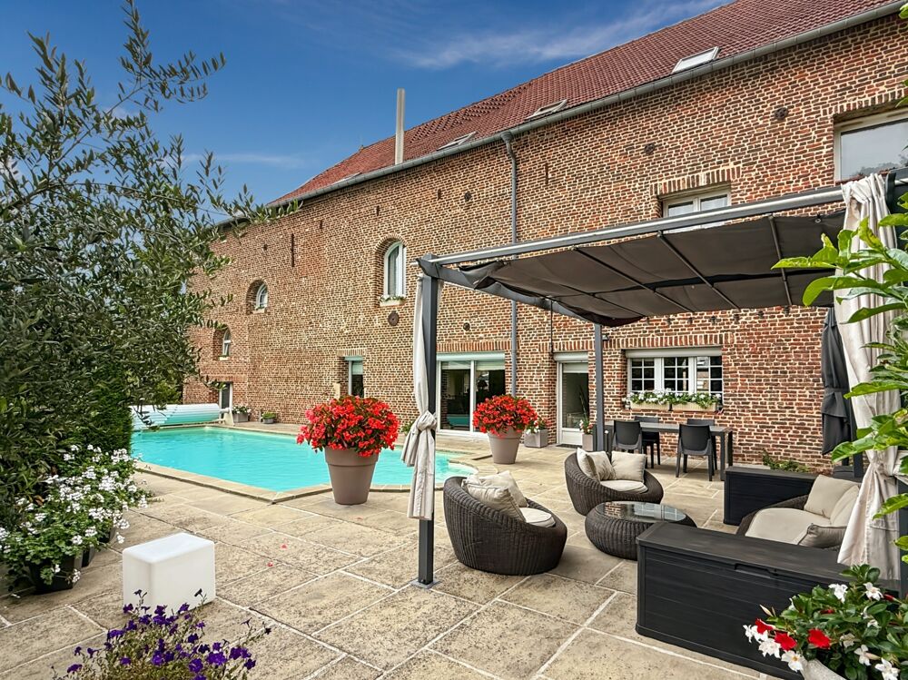 Ligny-en-Cambrésis  Propriété de charme avec piscine et parc arboré