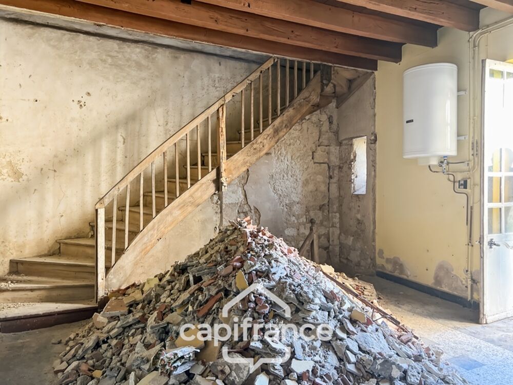 Maison en pierre à rénover avec fort potentiel en plein coeur de Puymirol
