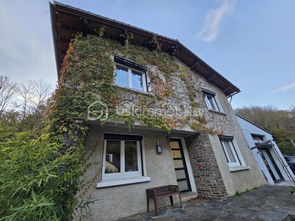 Maison individuelle avec garage et atelier