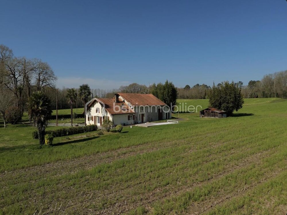 **Maison landaise de caractère avec piscine et parc arboré  Fort potentiel**