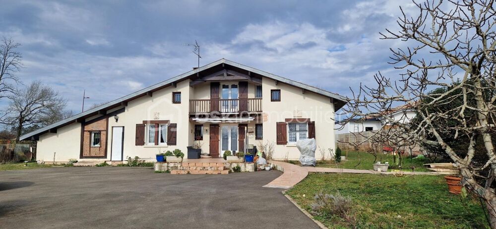 Charmante landaise de 200 m2, 6 chambres, véranda + dépendance de 120 m2 sur terrain 2328 m2