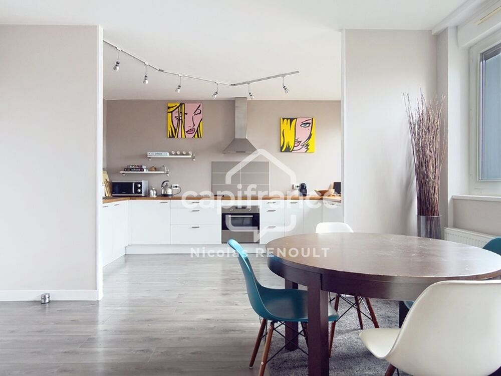 Appartement spacieux avec cave & parking