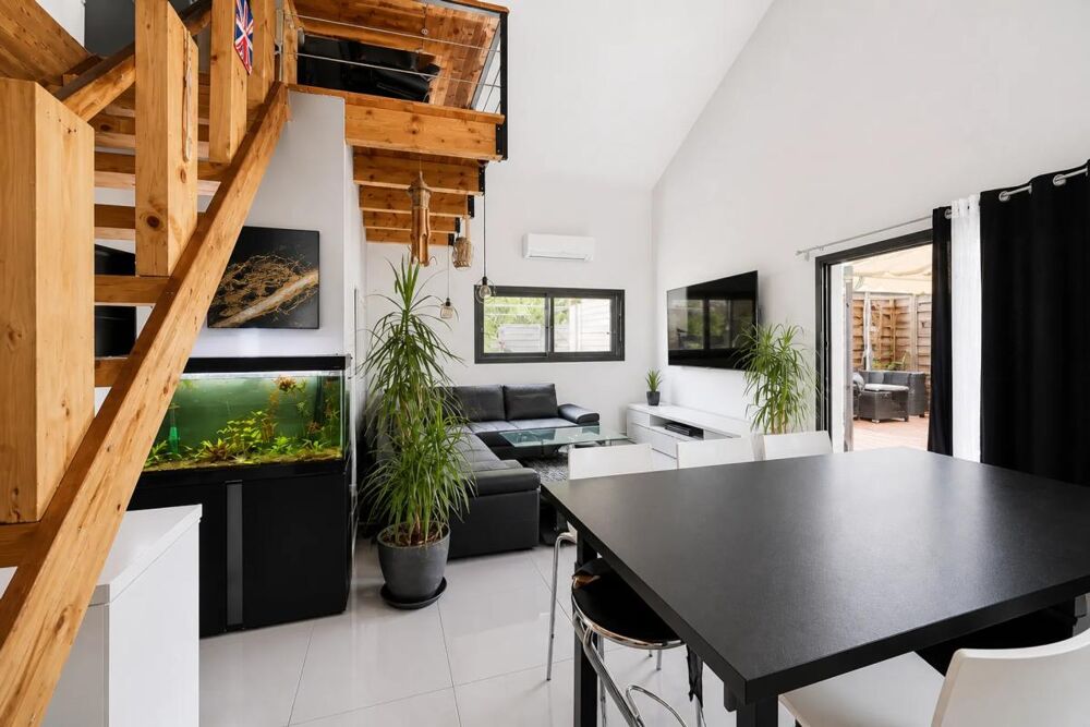 Ensemble immobilier - deux maisons louées sur un terrain 1 434m²