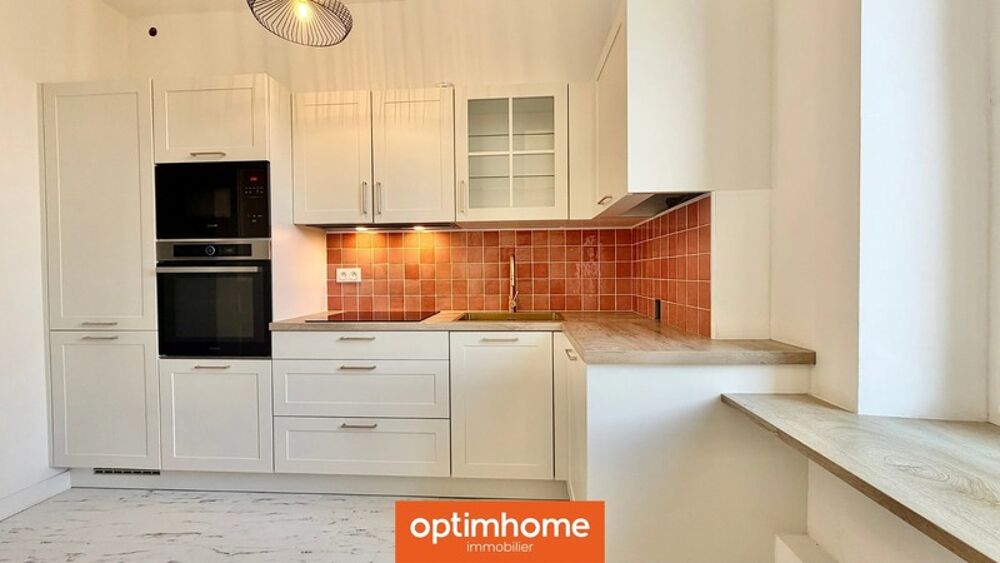 Appartement de charme rénové avec balcon, cave et faible charges  75 m²  Lumineux & élégant