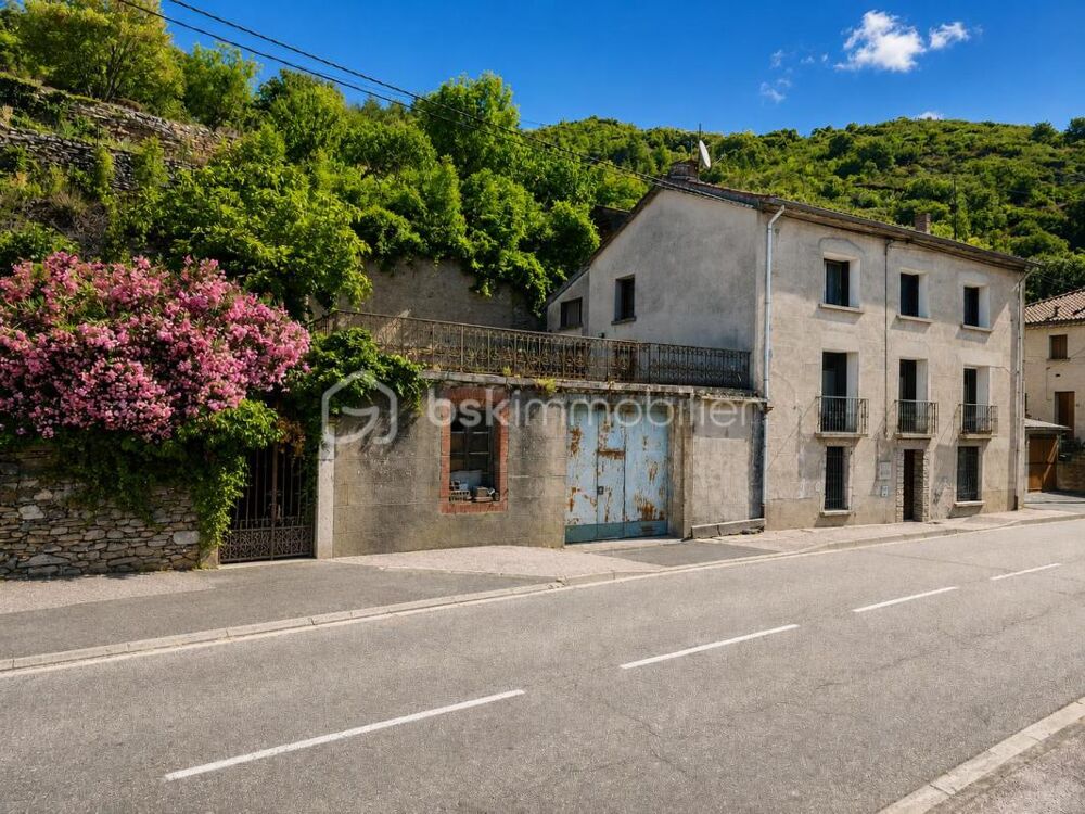 MAISON DE VILLAGE AVEC TERRAIN - TERRASSE ET GRAND GARAGE