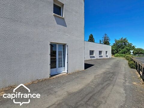   Local d'activité 260 m² + logement 132 m² – parking privé – terrain 1 690 m² – forte visibilité – Thouars (79100) 