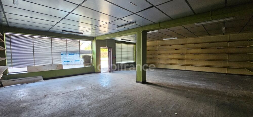   Bâtiment professionnel 1 300 m² + 7 garages – 5 min LONS LE SAUNIER (39000) Lons le saunier