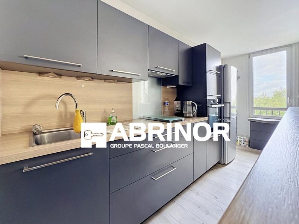 Appartement de Type 2 - balcon - cave - place de parking