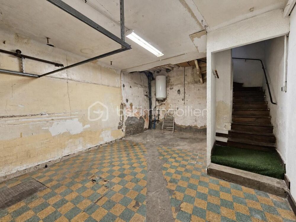 MAISON DE VILLAGE - GARAGE - 1 CHAMBRE
