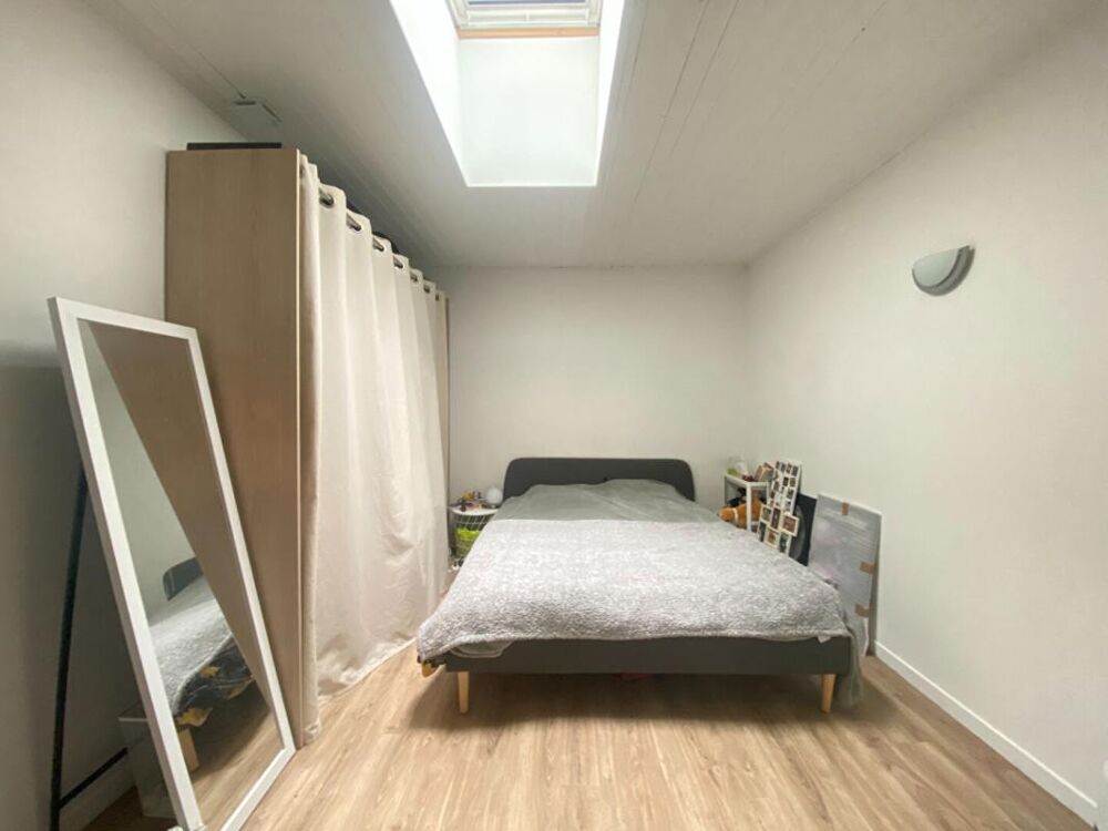 Maison divisée en deux appartements avec jardinet