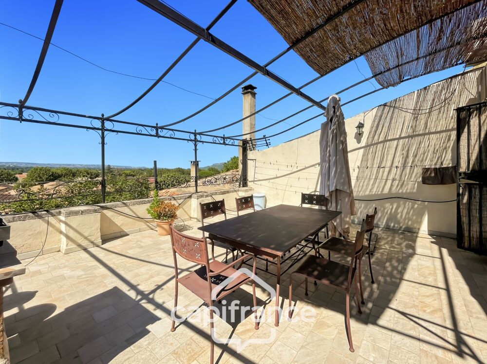 ne demeure de caractère au coeur de la Provence : 242 m2 de superficie habitable , une TERRASSE PANORAMIQUE. Distribution sur 3