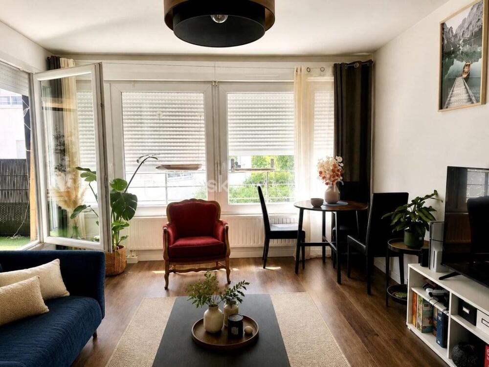 T3 avec terrasse, balcon et place de parking en sous-sol