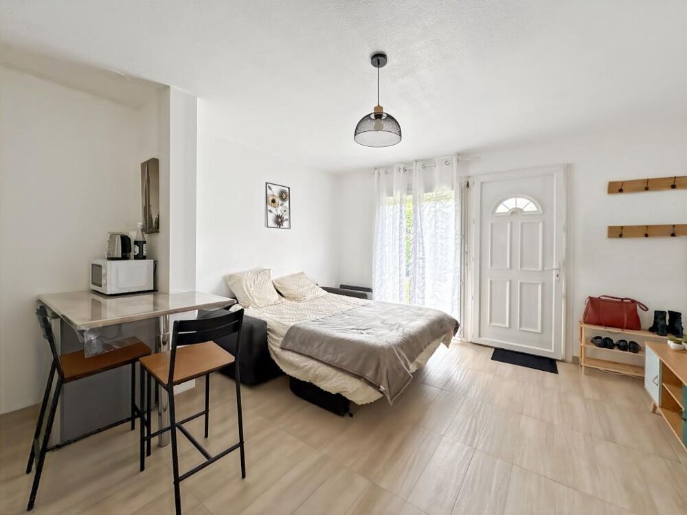 À Vendre  Studio VENDU LOUÉ avec Stationnement dans résidence sécurisée