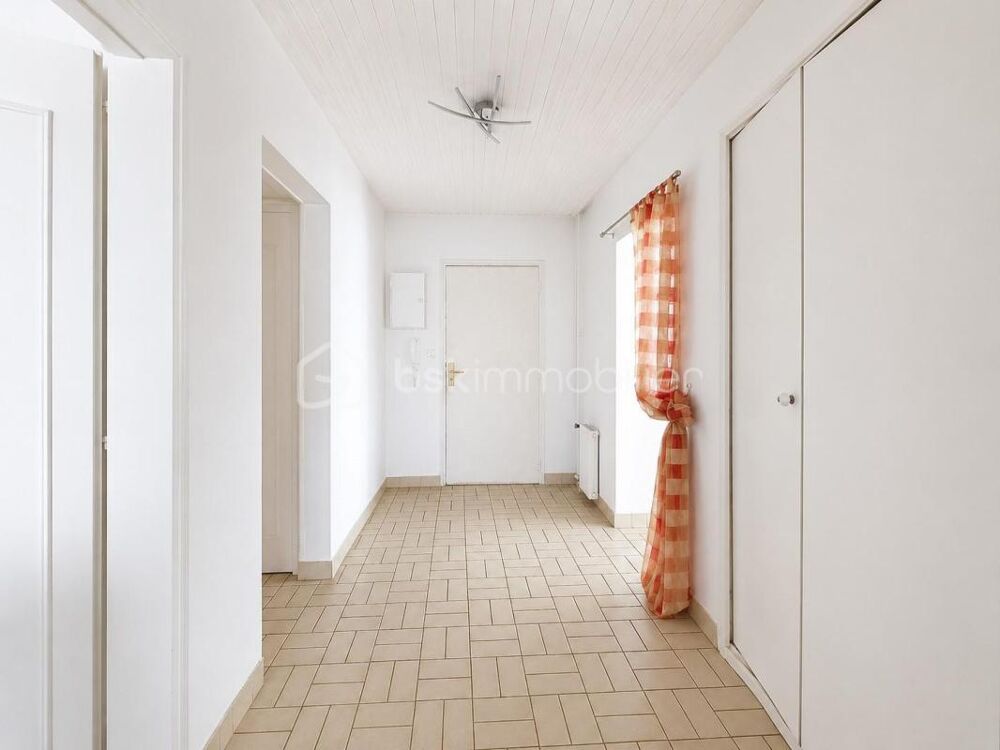 Appartement T5 - 104m² avec balcon, parking et cave