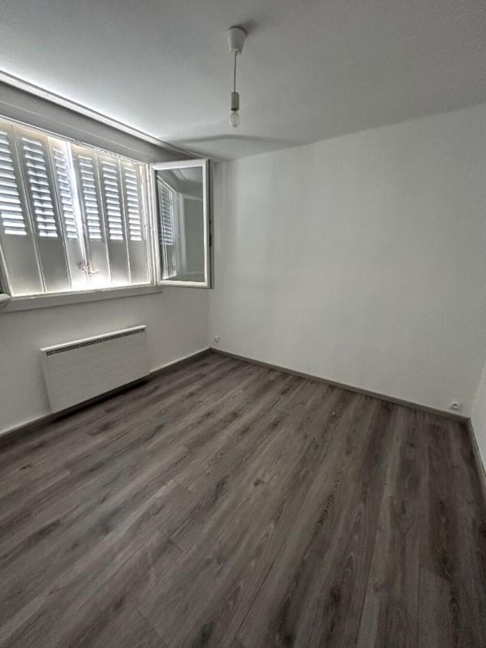 À vendre T4 lumineux au dernier étage, proche centre-ville et commerces