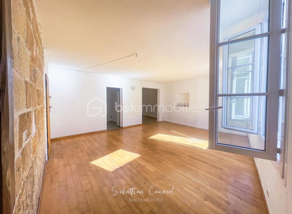 Vente Appartement Nouveau prix · Grand T1 bis 55,41 m² de caractère, pierre et lumière sud-ouest · DPE C · Montpellier Écusson (34000) · rue Caban Montpellier