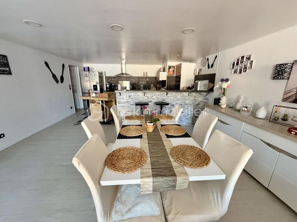 Maison mitoyenne de plain-pied de 95 m² avec terrasse à découvrir