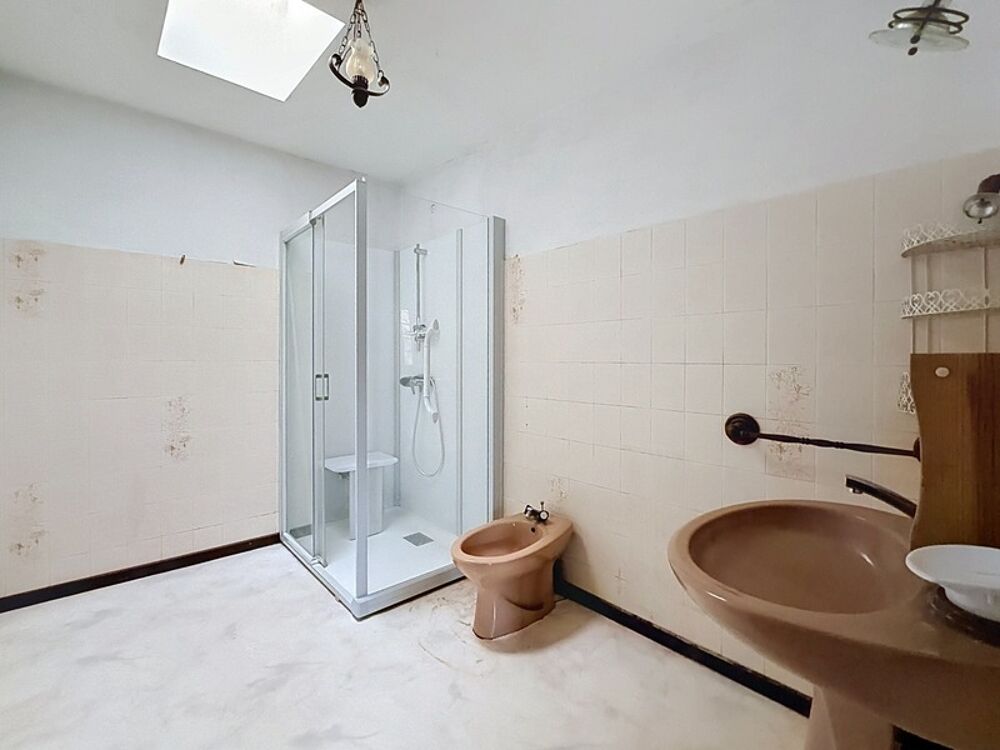 Vente Maison Maison de ville 90 m² – Grand séjour avec mezzanine – 2 chambres – Deux garages et cave – Centre de Sainte-Foy-la-Grande Sainte foy la grande
