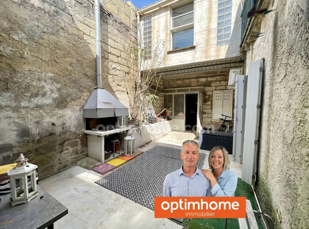 MAISON DE VILLAGE TRAVERSANTE AVEC PATIO ET GRAND GARAGE
