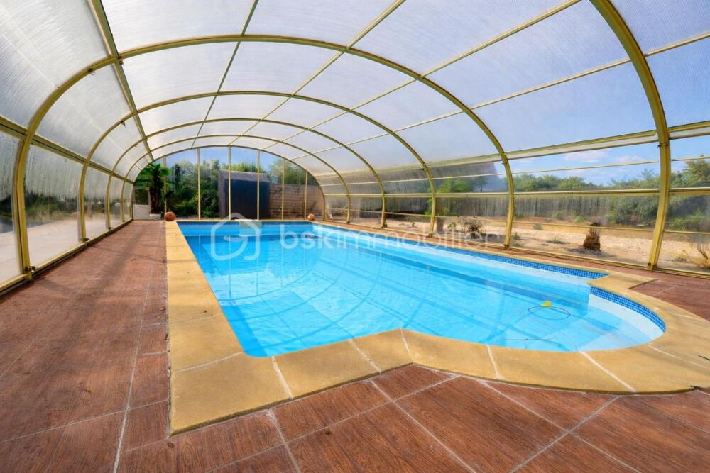 PROPRIÉTÉ DEXCEPTION 214 m²  PISCINE  TERRAIN 2 872 m² + PARCELLE CONSTRUCTIBLE  PRESTATIONS COMPLÈTES