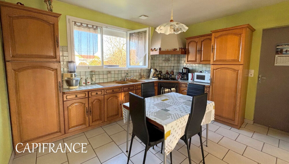 Maison familiale - 4 chambres, 102 m² habitables avec garage et appentis et jardin sur un terrain 900 m²