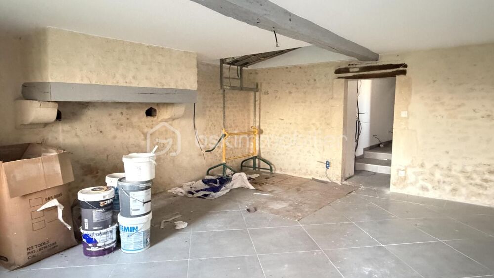 Maison avec 2 logements, granges et terrains constructibles