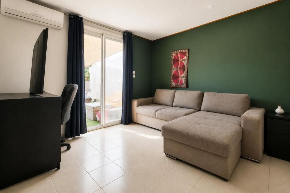Appartement de 3 pièces de 65 m² à Perpignan + garage et cours