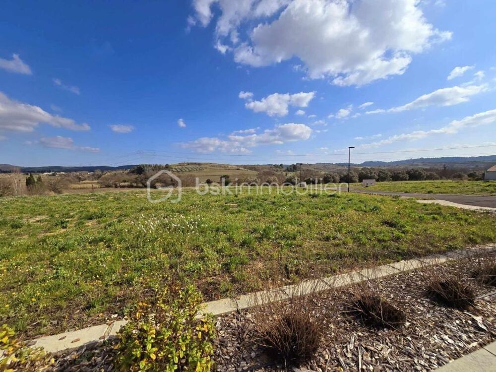 Vente Terrain TERRAIN 652 m² CONSTRUCTIBLE et VIABILISE au sein d'un Charmant Village entouré de Vignes Gignac