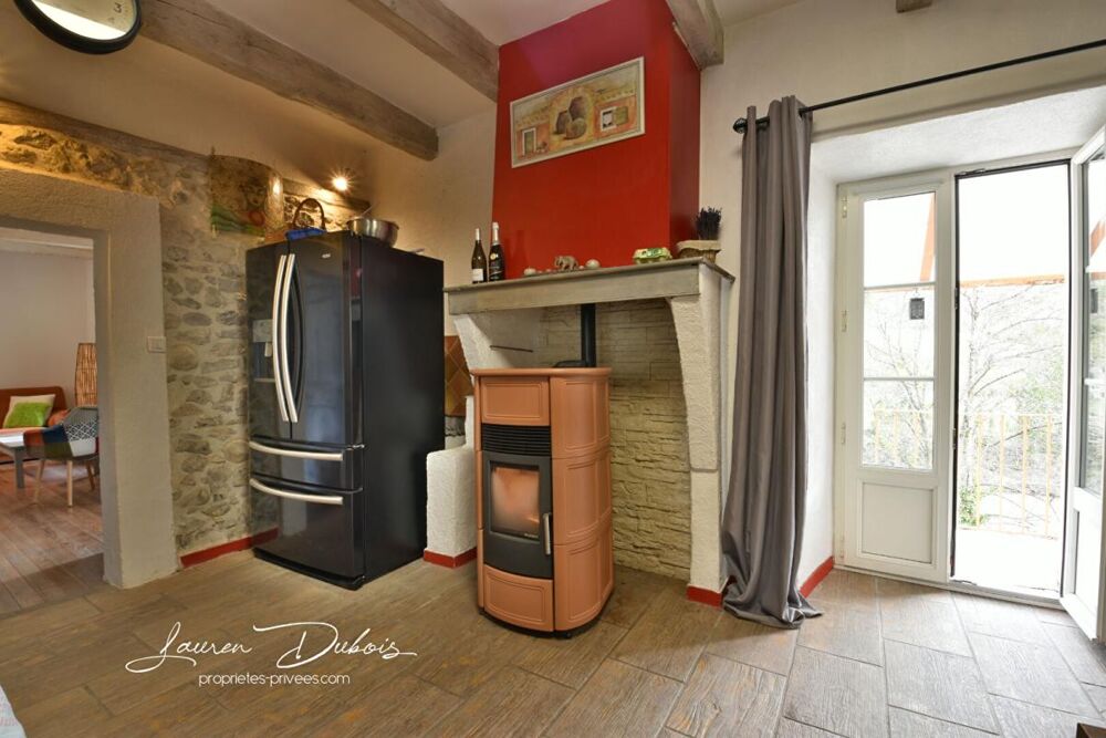 Vente Maison SERRES - Charmante maison de ville de 122 m² avec jardin, garages et dépendances Serres