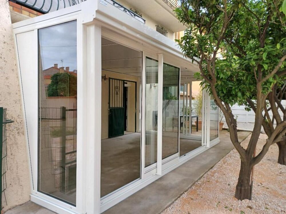 Magnifique appartement de type T2 en rez-de-chaussée avec jardin de 170 m² sans vis-à-vis et véranda de 20 m²