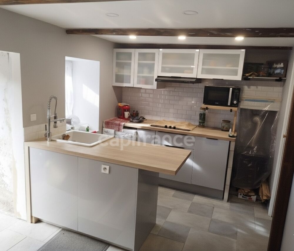 Maison en pierres 3 pièces entre Carhaix et Rostrenen plain pied 92 m2 dont combles aménageables