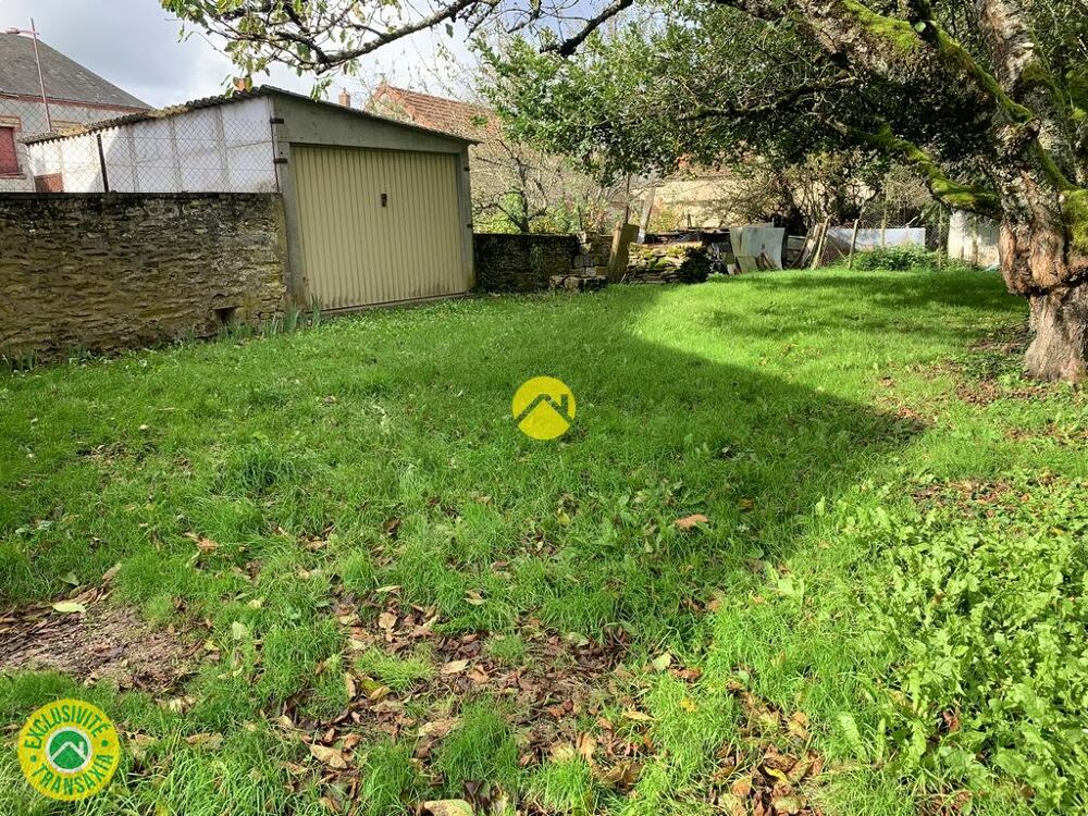 EN BOURG AVEC JARDIN