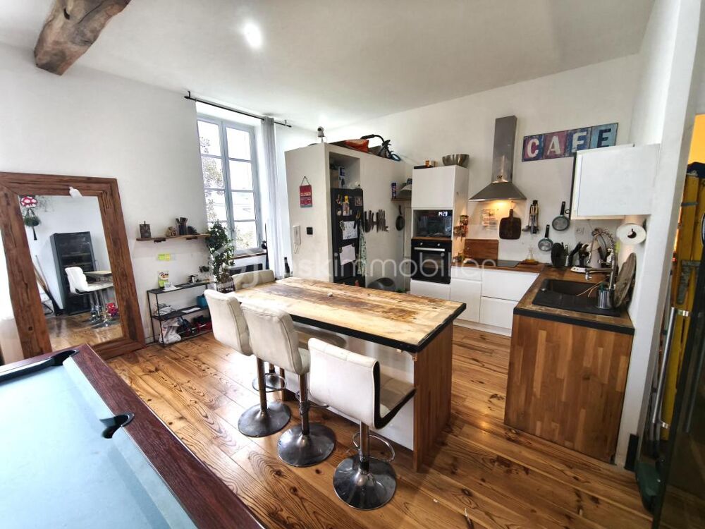BEL APPARTEMENT AVEC GRANDE PIECE DE VIE