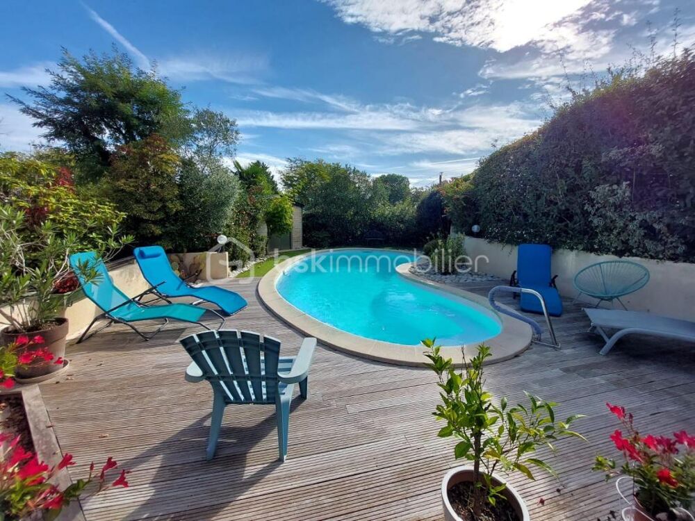 Charmante maison avec piscine et espaces de vie généreux