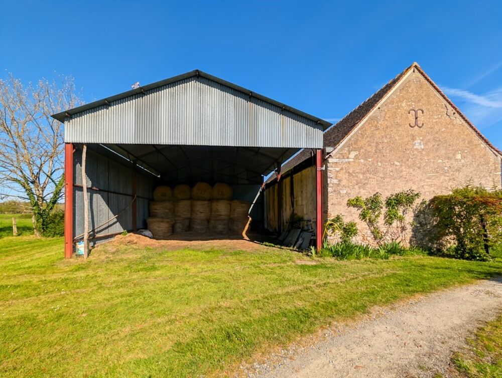 Propriété avec hangar et 4 800 m² de terrain