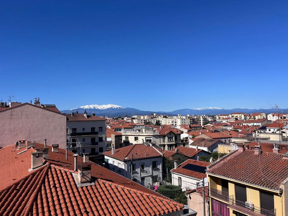 Charmant appartement de type loft au dernier étage d'une résidence de standing avec petite terrasse