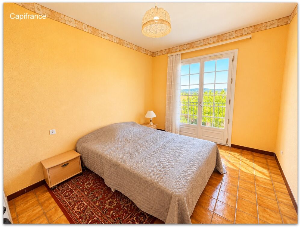 Grande villa familiale de 204 m² avec appartement indépendant, terrain piscinable de 2 178 m² et vue dégagée - Roujan (34320)