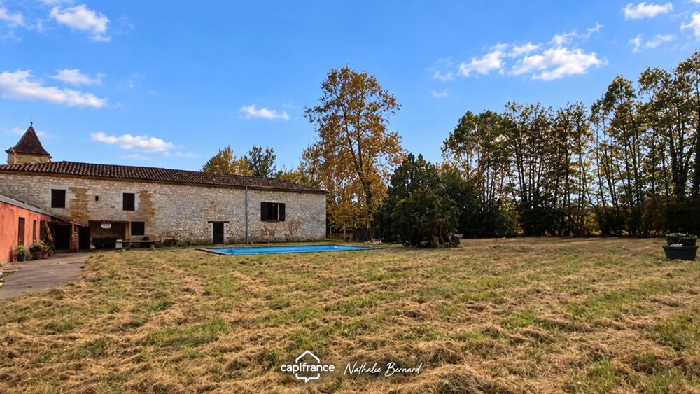 FUMEL  ENSEMBLE IMMOBILIER EN PIERRE À RÉNOVER SUR PRÈS DE 2 HA
