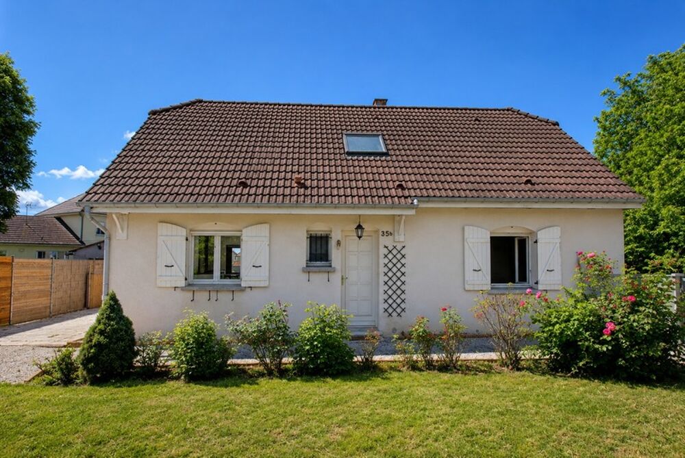 Maison familiale de 128 m²  4 chambres, double garage, proche de Tavaux