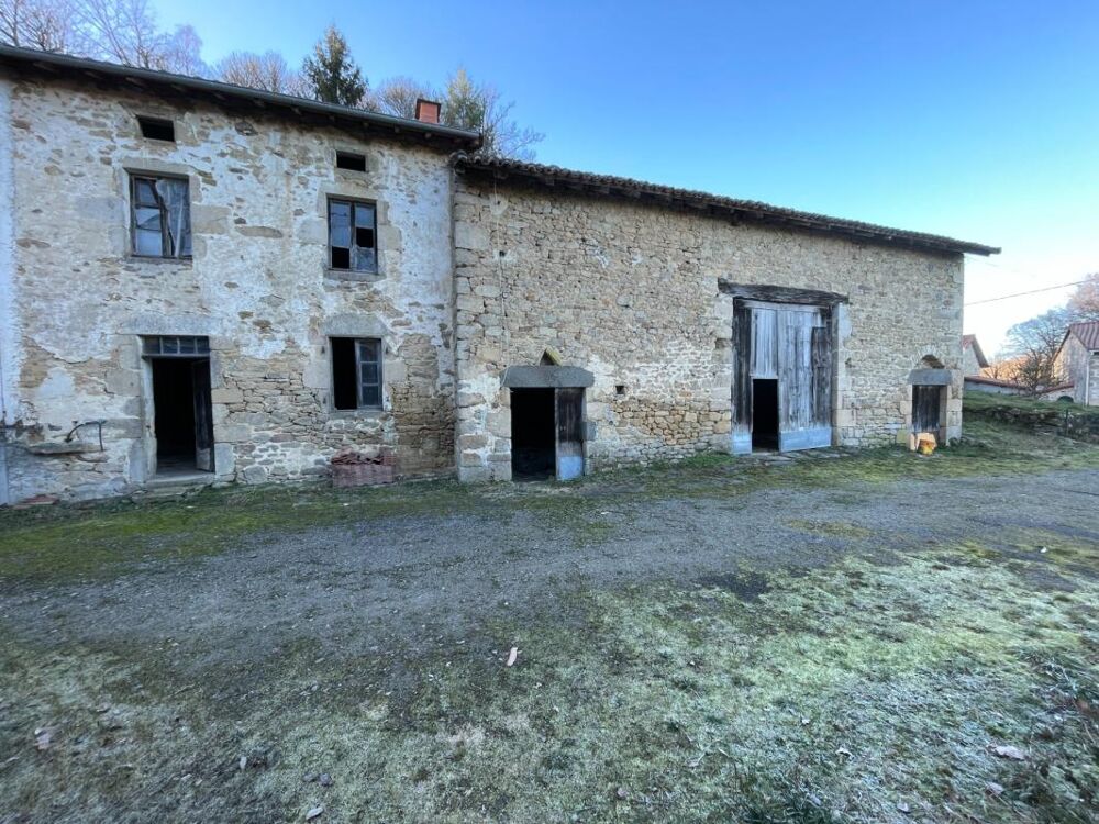 Corps de ferme avec deux maisons, granges et terrain